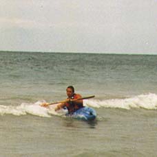 Andy Schudlich rides a wave