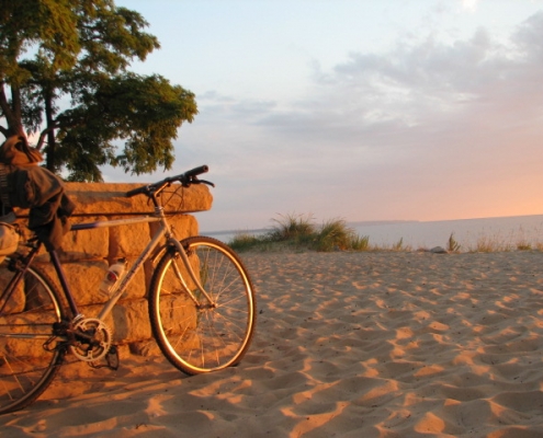 Empire beach sunset with bicycle by kcunning