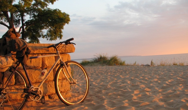 Empire beach sunset with bicycle by kcunning