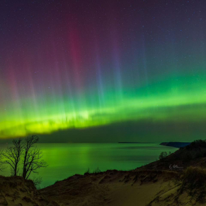 Aurora Borealis Dancing over Sleeping Bear by Captures by Ethan