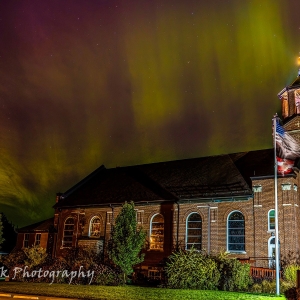 Aurora over Holy Rosary Catholic Church. by Watermark Photography